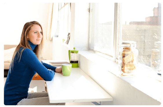 Woman looking out window