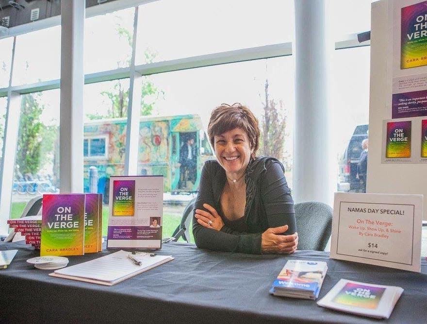 Book Proposal client Cara Bradley signing copies of On the Verge, published by New World Library, and featured several times on the Oprah Network!