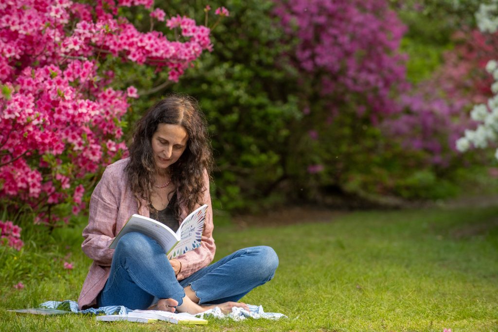 Lisa Tener writing in journal